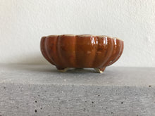 Riflet orange potte